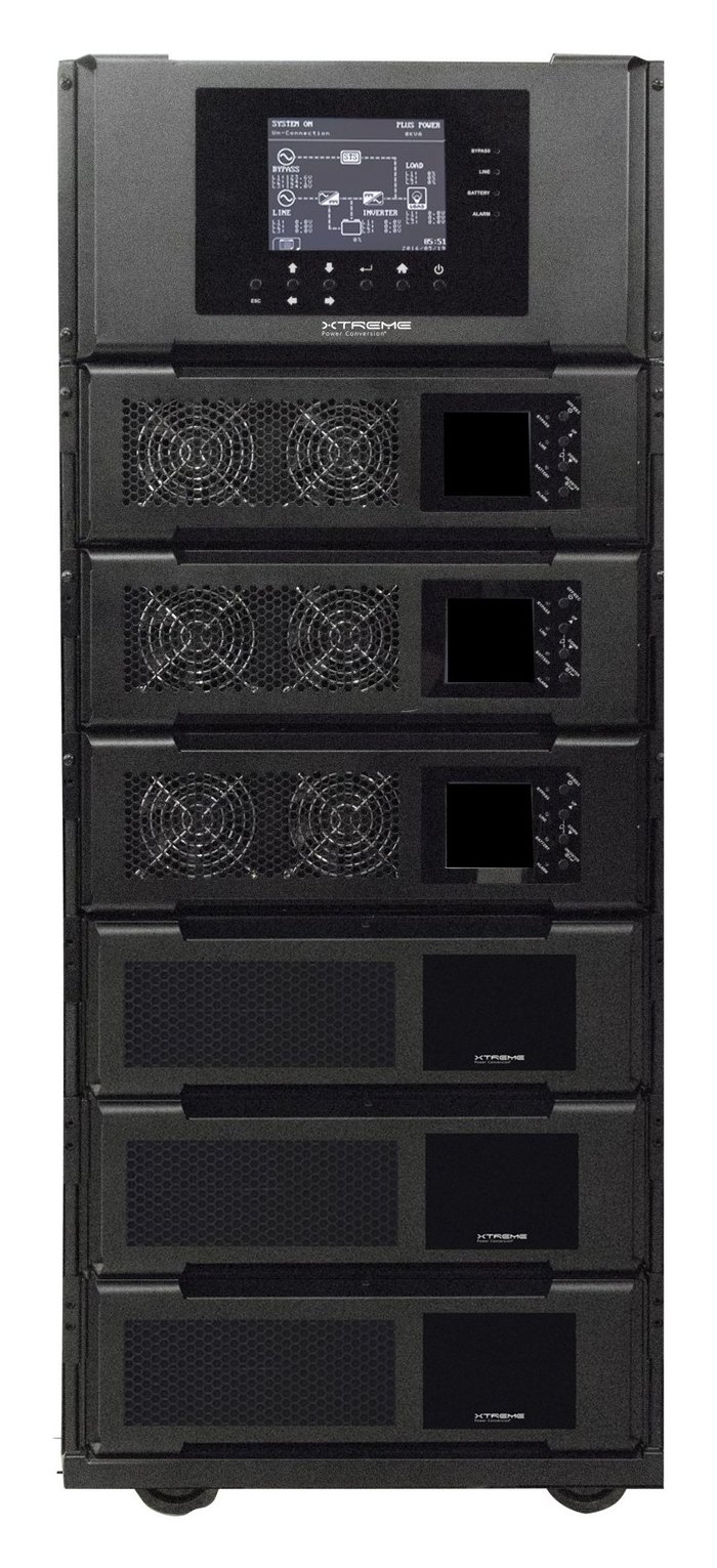 Xtreme Power M90Si-6S modular single-phase UPS, front view with three 10 kW power modules above three battery modules and the 145 mm system display