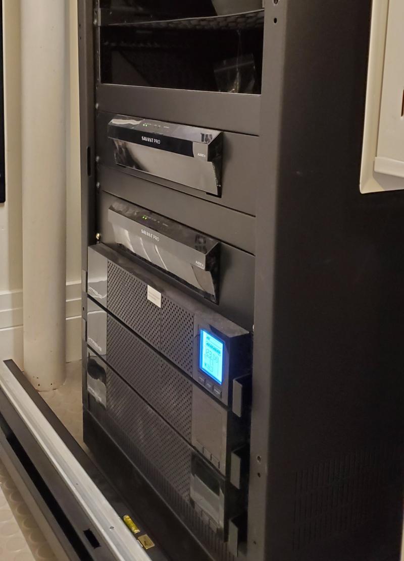 P80-1500 with external battery modules backing a Savant control system in an AV rack