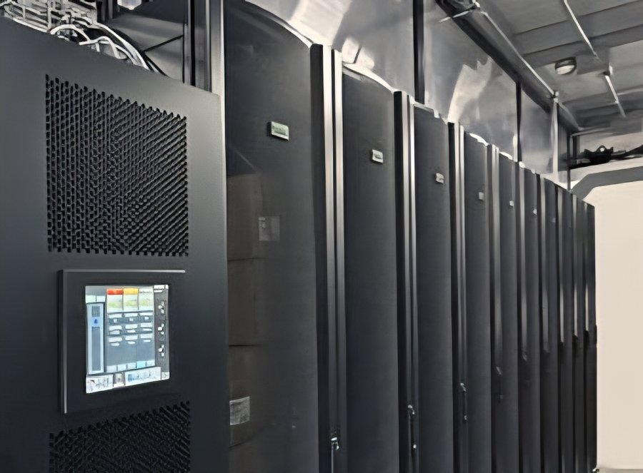 A row of X90 modular UPS cabinets deployed in a data center power room