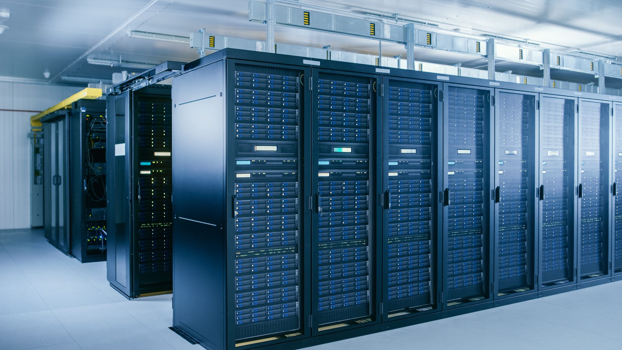 High-density data center rack rows representing distributed, rack-level power architecture