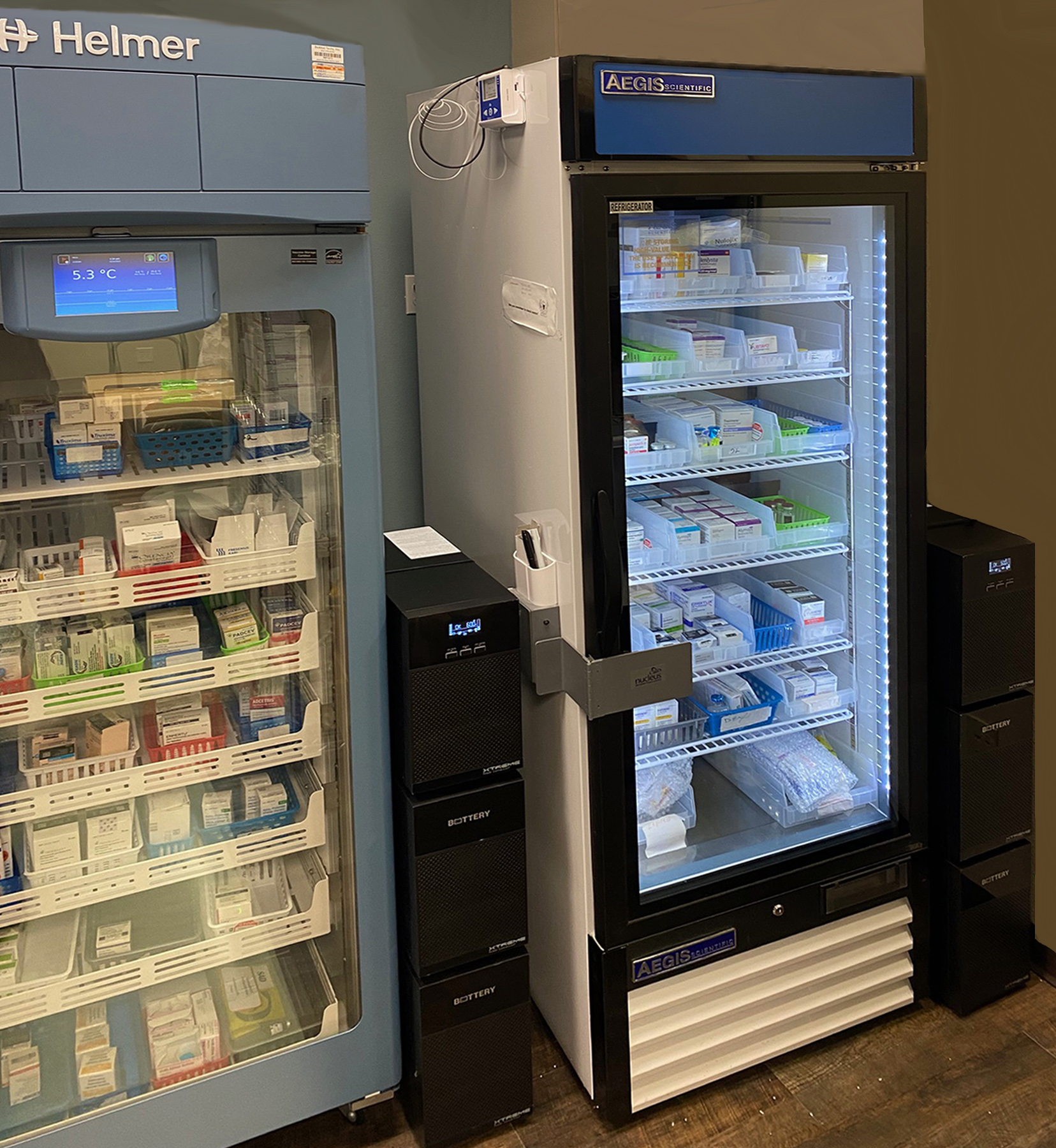 Xtreme Power T91 UPS systems with stacked external battery packs supporting medical refrigerators used for oncology drug storage